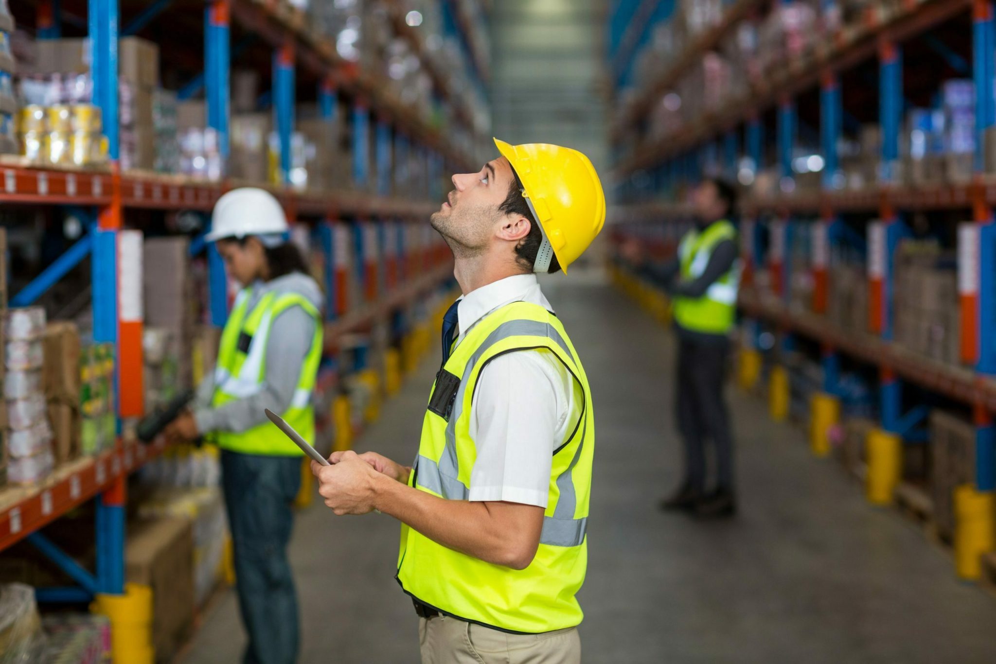 Warehouse manager looking at packages