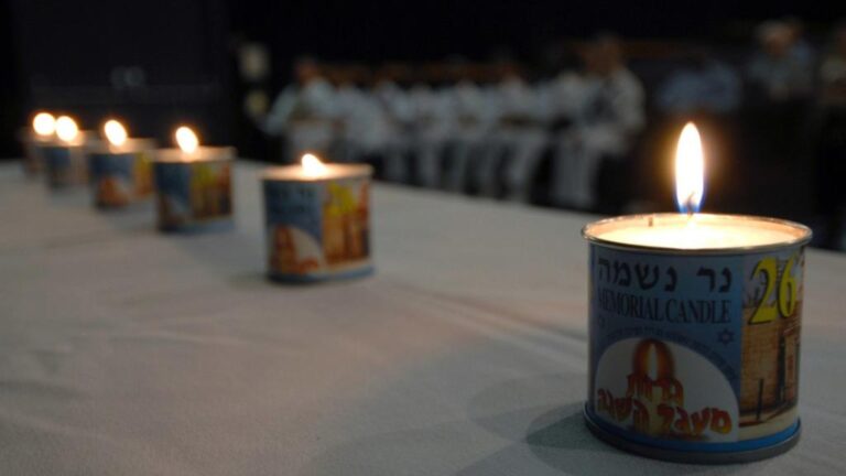 US_Navy_070426-N-4965F-003_Six_memorial_candles_are_lit_during_a_Holocaust_Remembrance_Day_ceremony_at_Sharkey_Theater_on_board_Naval_Station_Pearl_Harbor-1024x576